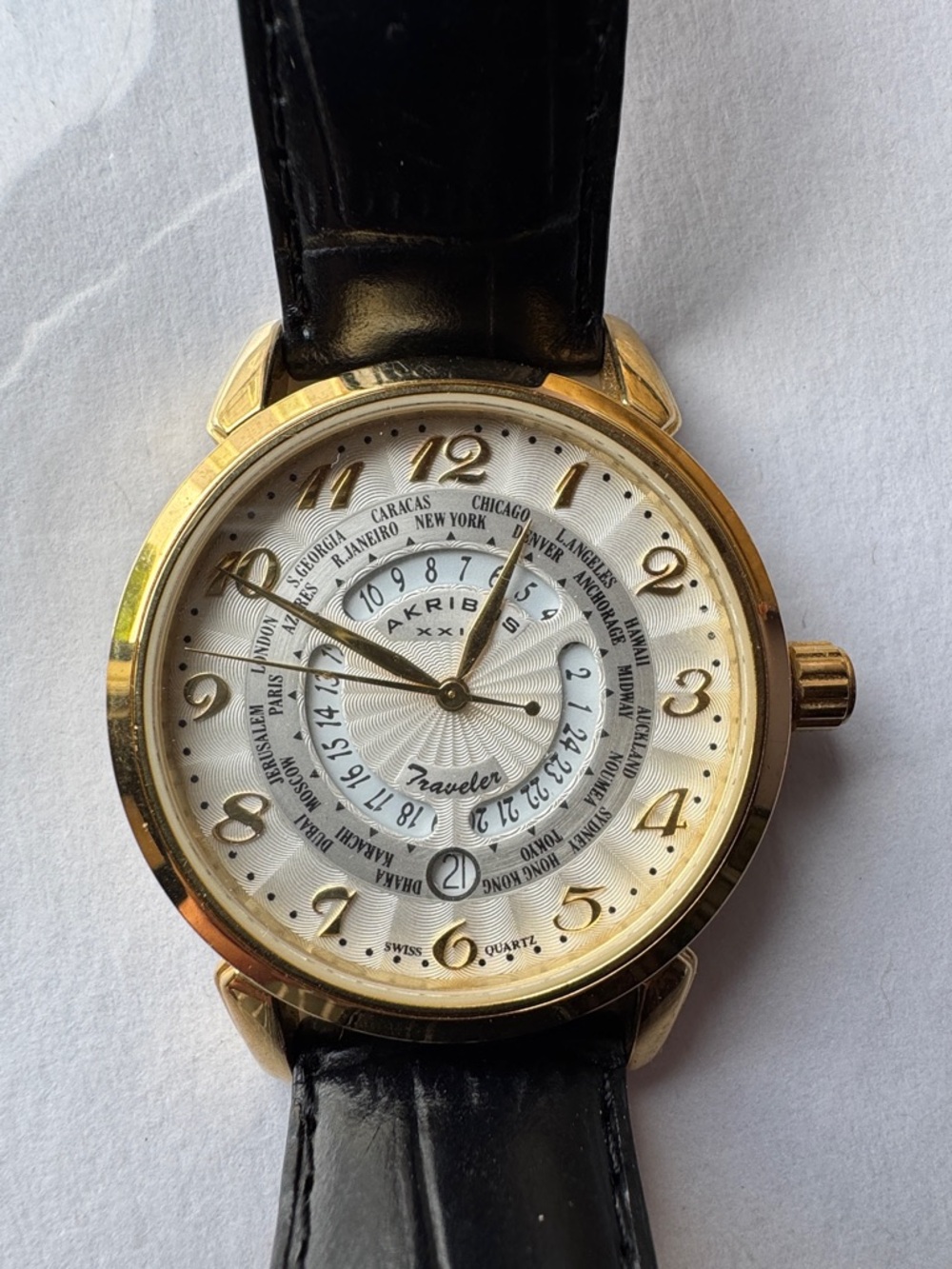 Akribos XXIV Gold Tone Watch with White Dial and Black Leather Strap